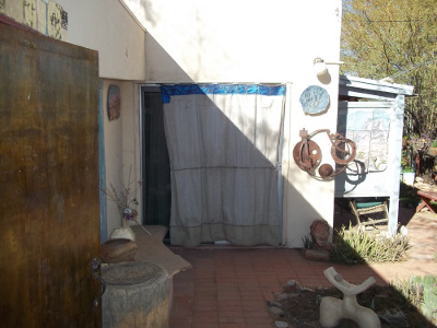 Curtain over sliding glass door stops heat before it hits glass